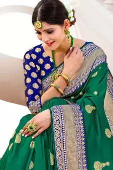 Green woven silk saree with blouse