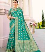 Green woven silk saree with blouse