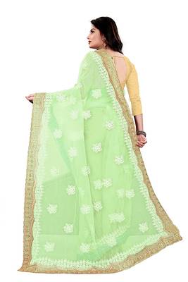 Light green embroidered net saree with blouse 2