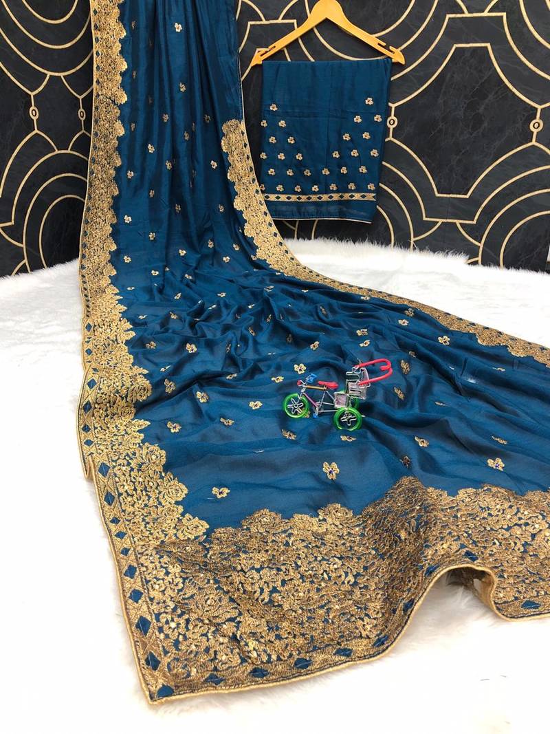 Blue embroidered pure georgette saree with blouse