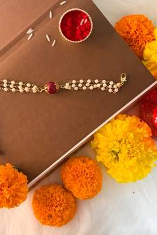 Designer White Pearl Lumba Rakhi For Bhabhi 