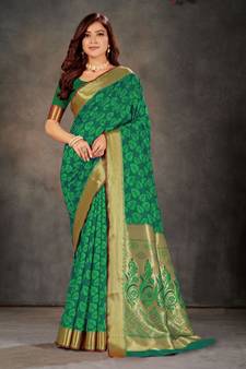 Dark green woven art silk saree with blouse