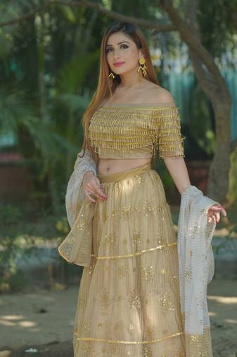 ALL OVER SITARA GOLD LEHENGA WITH OFF SHOULDER BLOSE IN CASCADING BEADED BLOUSE