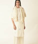 Ivory woven kurta set with tassled scarf