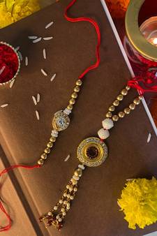 Gold Plated Bhaiya Bhabhi Rakhi and Lumba Set Glided With Kundan & Pearl (R615CO)
