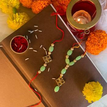 Gold Plated Stone Studded Pearl Rakhi and lumba Set for Bhaiya Bhabhi  1