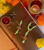 Gold Plated Stone Studded Pearl Rakhi and lumba Set for Bhaiya Bhabhi 