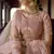 Peach Sequins zari and resham embroidered georgette semi stitched wedding lehenga