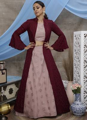 Baby-pink thread embroidery net semi stitched lehenga 1
