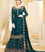 Turquoise embroidered faux georgette salwar