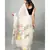 Linen silk jamdani saree with delicate jamdani nature motifs