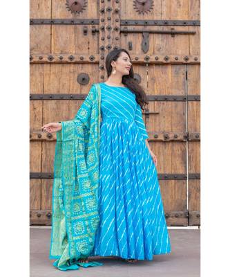 This is upada silk gown with hand tie and die leheriya along with banarsi dupatta 1