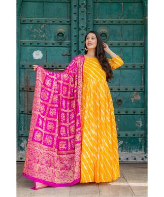 This is upada silk gown with hand tie and die leheriya along with banarsi dupatta 2