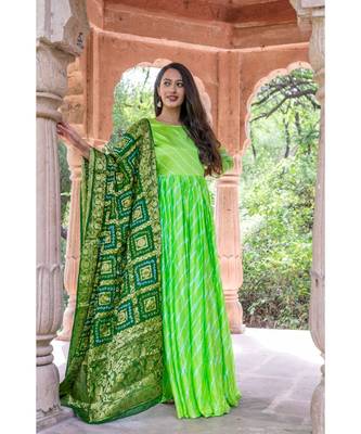 This is upada silk gown with hand tie and die leheriya along with banarsi dupatta 1