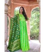 This is upada silk gown with hand tie and die leheriya along with banarsi dupatta