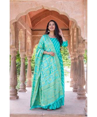 This is upada silk gown with hand tie and die leheriya along with banarsi dupatta 6