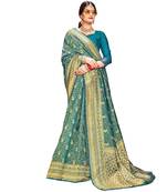 Turquoise woven banarasi silk saree with blouse