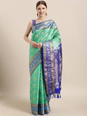 Green hand woven kanchipuram silk saree with blouse 1