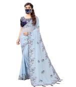 turquoise embroidered silk blend saree with blouse