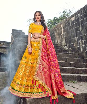 Yellow and Pink Heavy Embroidered Designer Lehenga  1