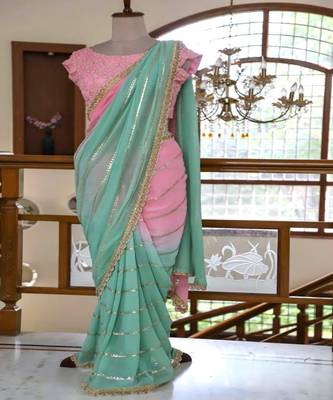 Peach embroidered georgette saree with blouse 1