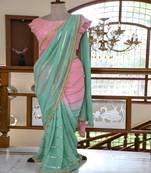 Peach embroidered georgette saree with blouse