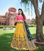 Yellow  Heavy Embroidered Silk Semi Stiched Lehenga