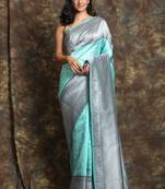 Sea Green silk saree with silver thread work and border