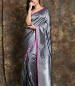 Dark silver silk sarees with silver zari butta work