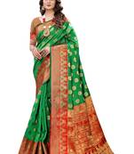 Green woven banarasi silk saree with blouse