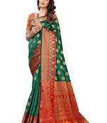 Green woven banarasi silk saree with blouse