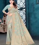 Light green woven silk blend saree with blouse