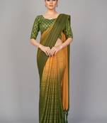 Dark green woven silk saree with blouse
