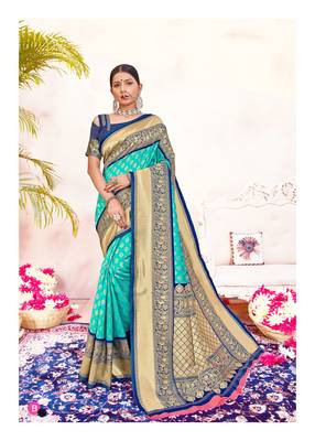 Turquoise woven silk blend saree with blouse 1