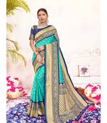 Turquoise woven silk blend saree with blouse