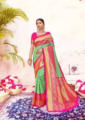 Green woven silk blend saree with blouse 1