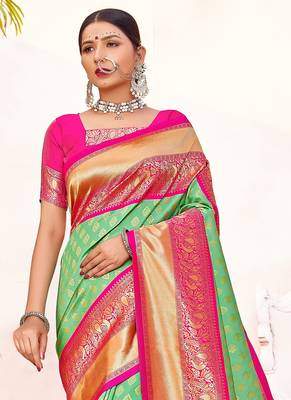 Green woven silk blend saree with blouse 2