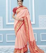 Peach woven banarasi silk saree with blouse