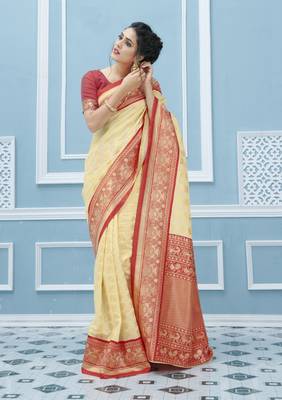 Cream woven banarasi silk saree with blouse 1