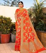 Dark orange woven silk blend saree with blouse