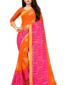 Orange printed georgette saree with blouse