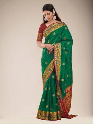 Green woven silk saree with blouse 1