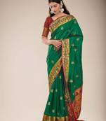 Green woven silk saree with blouse