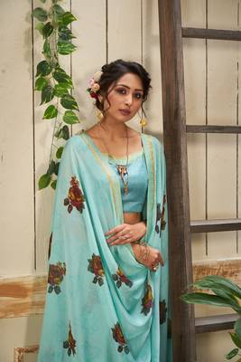 Blue printed georgette saree with blouse 1
