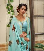 Blue printed georgette saree with blouse