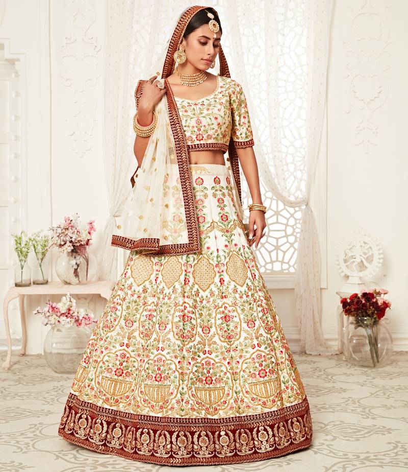Marvelous Off-white Art Silk Embroidered Lehenga Choli with Diamond Work