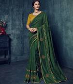 Green embroidered silk blend saree with blouse