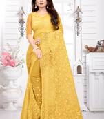 Yellow embroidered net saree with blouse
