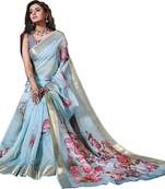 Turquiose printed organza saree with blouse