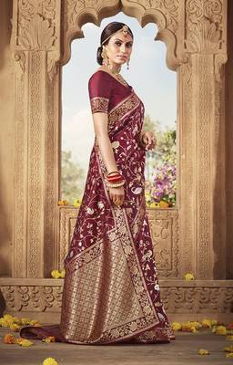 Maroon woven Banarasi silk blend saree with blouse 1